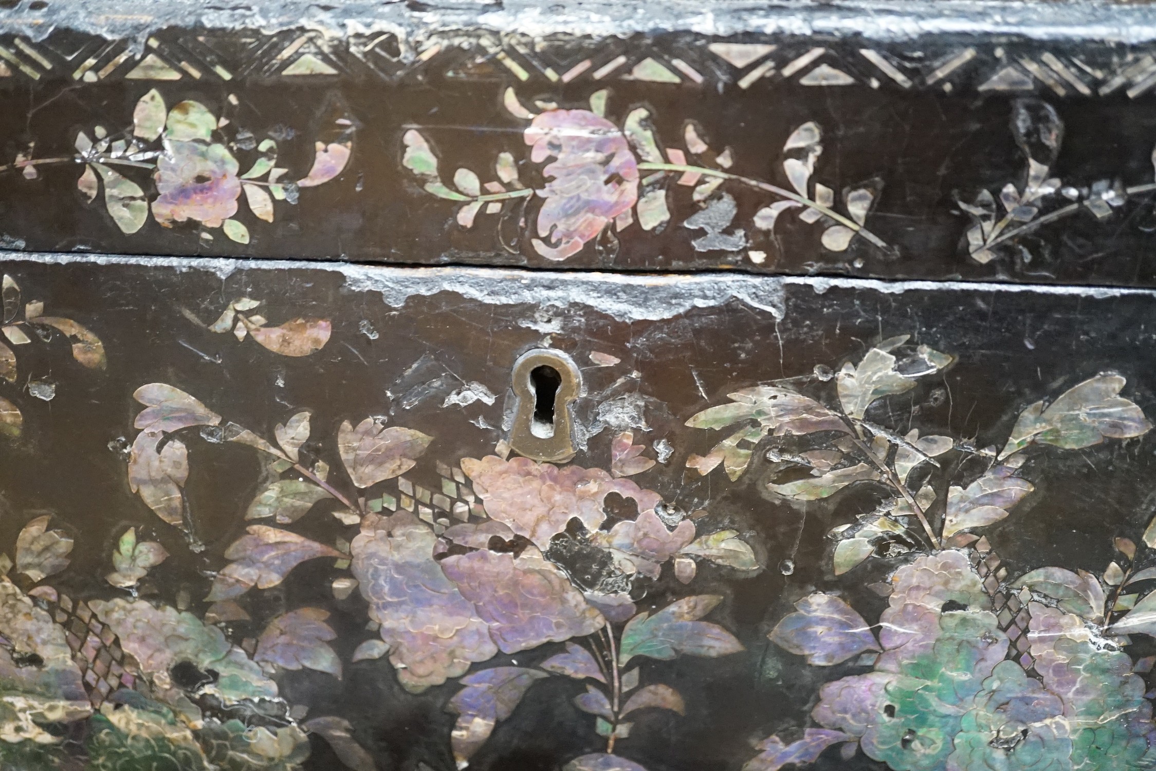 A late 19th century Chinese lacquer box, two smaller Japanese lacquer boxes, a doll, a collection of later paper fans etc, Chinese box 24cms high x 42cms wide